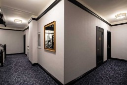 Hallway Renovations: Wallcovering vs. Paint. Which is Better for Your Apartment Building?