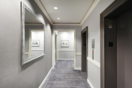 Hallway Renovations: Wallcovering vs. Paint. Which is Better for Your Apartment Building?